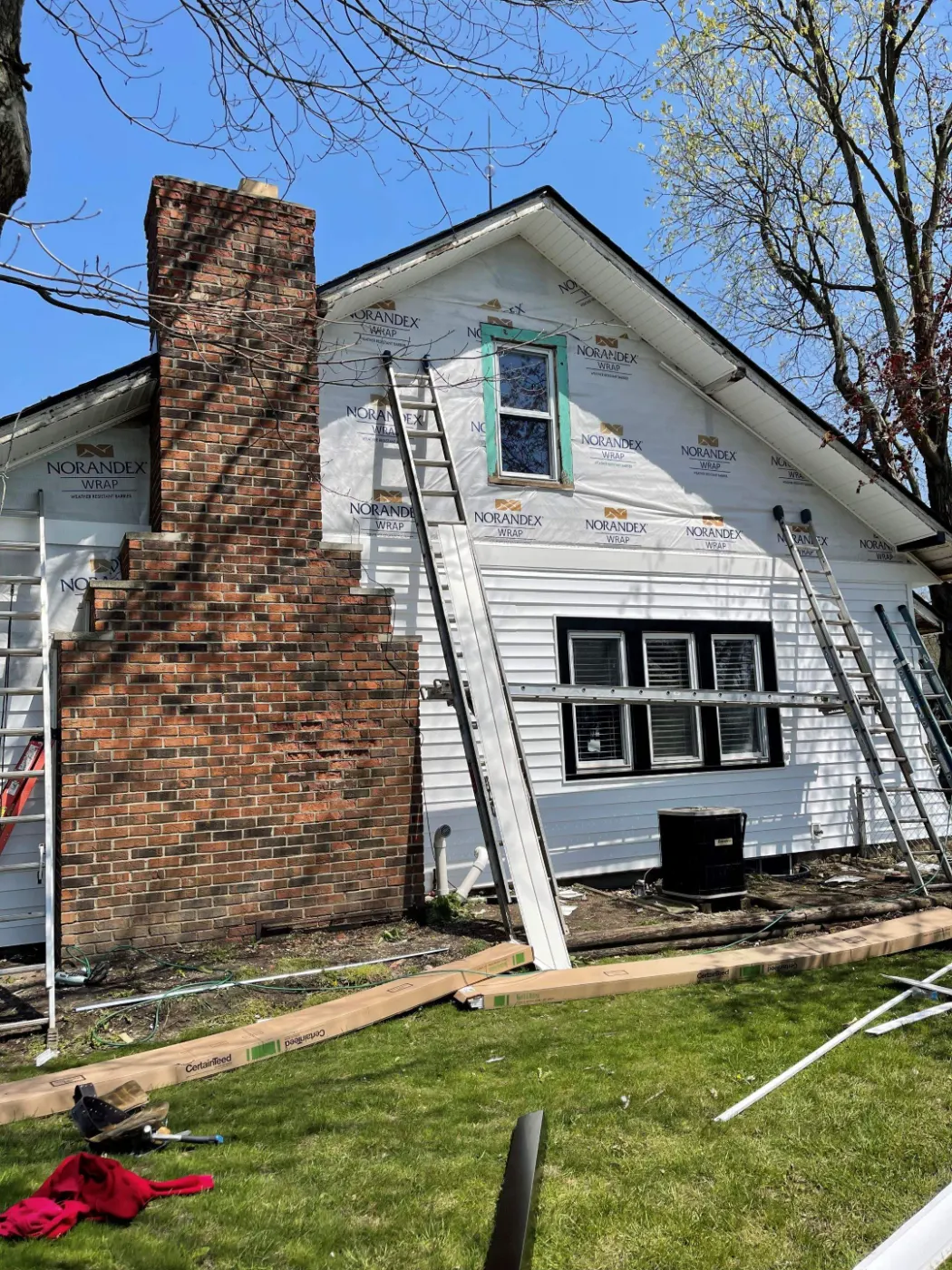 Storm-damaged siding documented in McCordsville